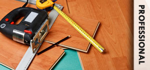Measuring tape and other flooring materials on the floor